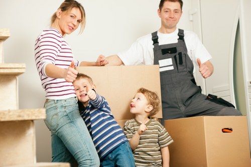 Experienced team packing business equipment for relocation